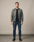 Men's gray leather bomber jacket with ribbed collar, cuffs and hem, front view, The Harlan Grey