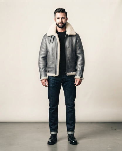 Men's gray B3 sheepskin aviator shearling jacket with ivory fur collar and belted hem, full body view