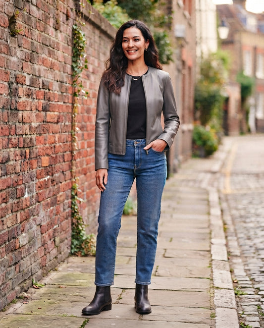Women's gray collarless café racer leather jacket, slim fit with front zip, full body view, The Sienna Gray